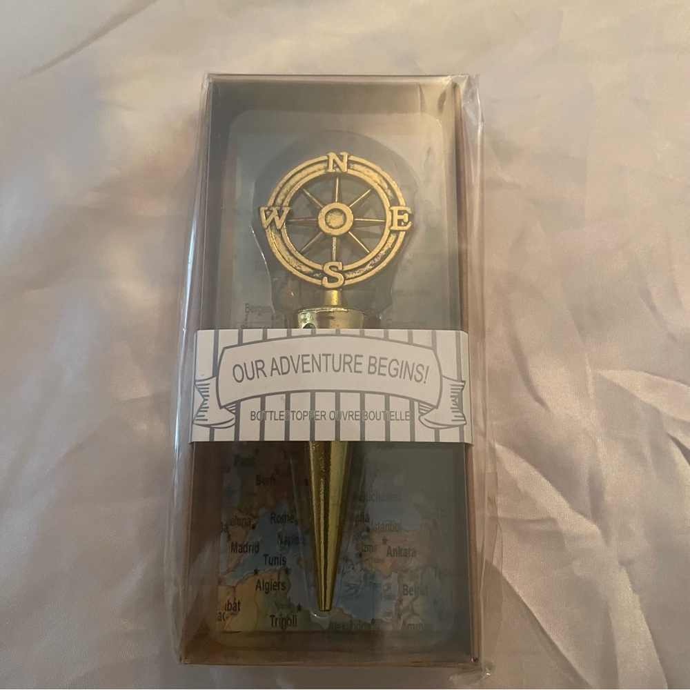 NWT Compass Bottle Topper